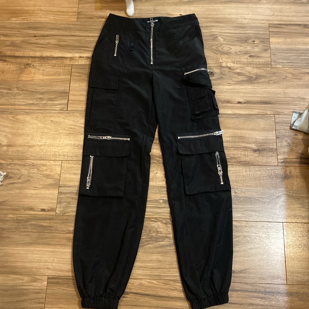Black rave pants with silver zippers